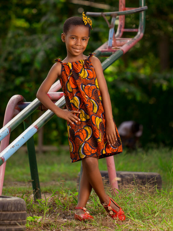 Red Girls African Print Dress with Shoulder Ties Model Wearing