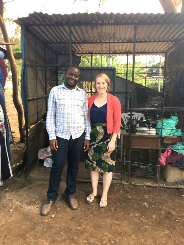 Kitenge's newest tailor Hassan with our founder Sian standing outside his own workshop in Arusha, Tanzania which he built himself from scratch