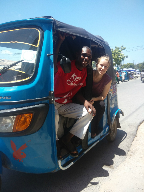 Sian and Oscar a bajaje tuk tuk driver in Tanzania