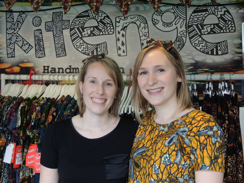 Kitenge Store founder Sian with her sister and volunteer Anna wearing a yellow African print top at Africa on The Square 2017