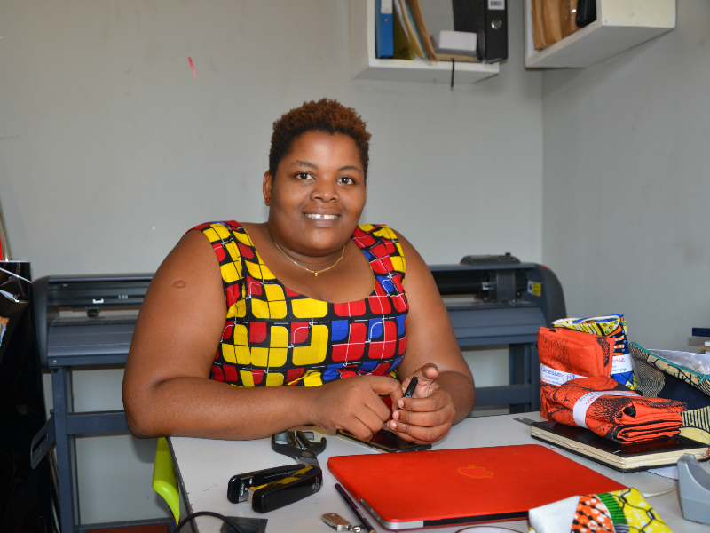 Kitenge tailor Betty in her old office in Tanzania before expanding her business