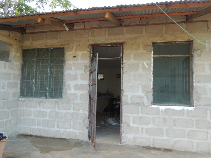 Kitenge tailor Betty's newly built workshop outside front view in Tanzania
