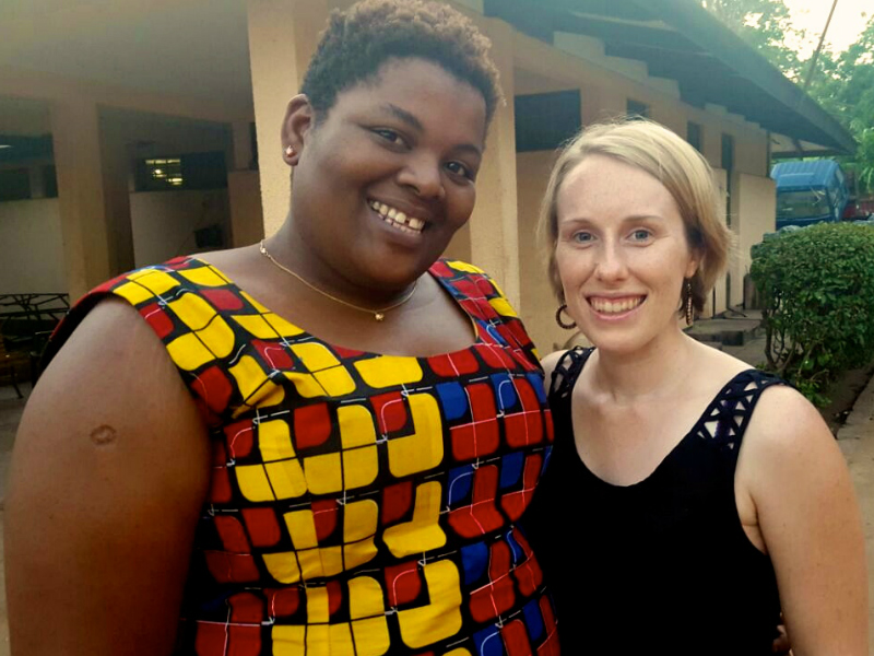 Kitenge founder Sian with our African print accessories tailor Betty in Tanzania standing outside her family home