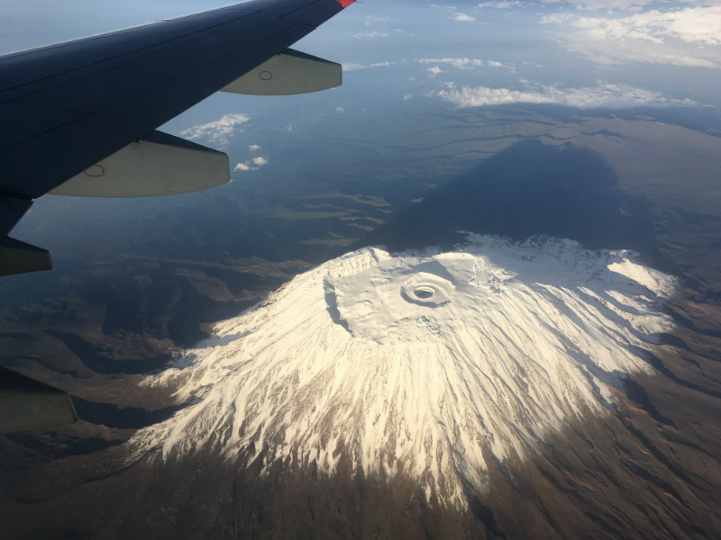 aerial view of Mount Kilimanjaro's snow capped peak in Tanzania