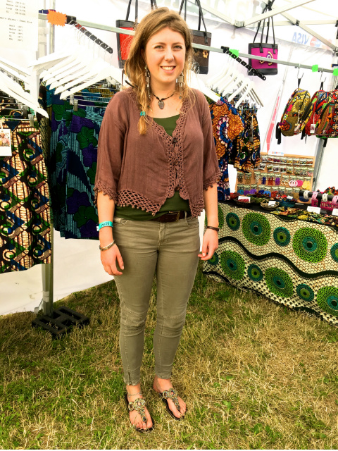 A Kitenge customer modelling her handmade African beaded leather sandals at LarmerTree Festival UK