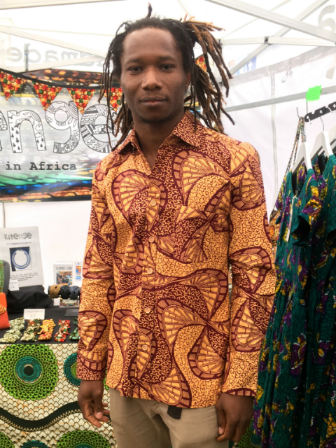 Men's cream African print long sleeve shirt worn by a musician at One Love Festival London UK