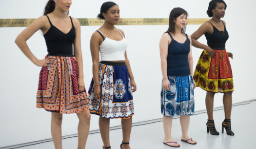 Models wearing African print kanga skirts by Kitenge at the Lubaina Himid exhibition in Bristol UK