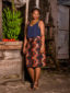 Red African print pencil skirt worn by a model in Tanzania