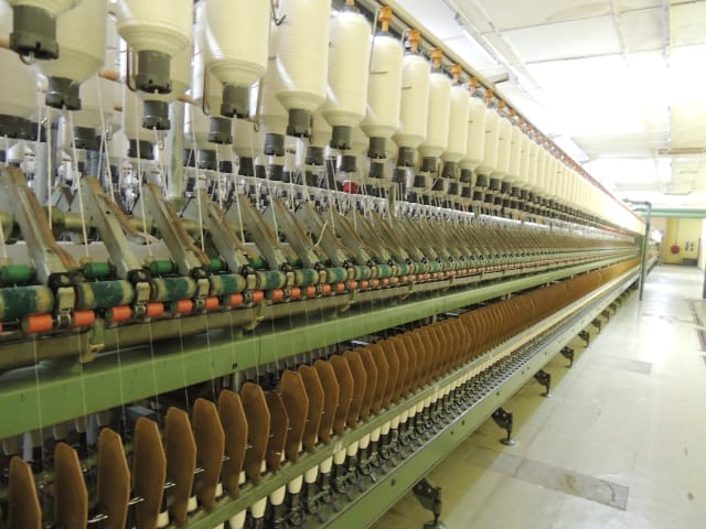 Cotton fibres spun into yarn to make ankara fabric