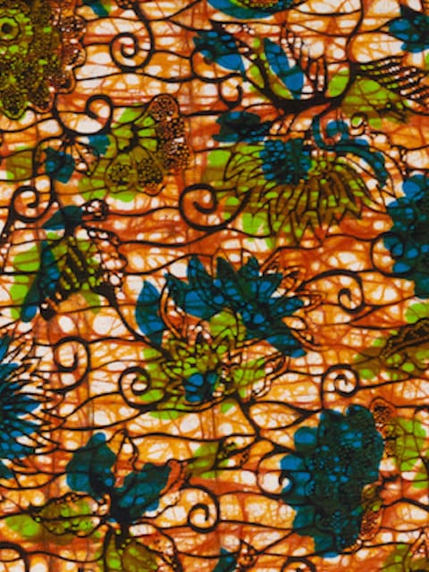 Green blue floral African print fabric crackling effect example closeup