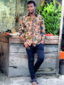 Men's green African Print Long Sleeve Shirt model wearing Tanzania front view