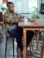 Men's green floral custom-made African print long sleeve shirt model wearing full outfit view
