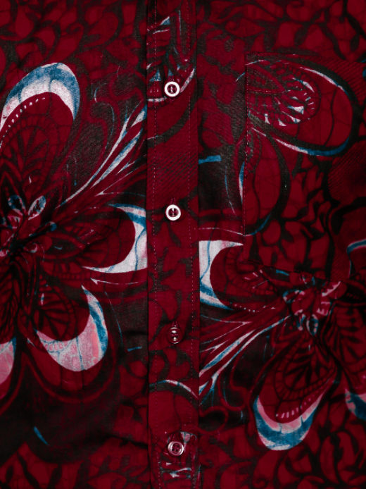 Men's maroon flower custom-made African print short sleeve shirt model wearing closeup placket and pocket