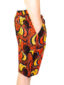 Men's red/yellow African print custom-made shorts model wearing side view