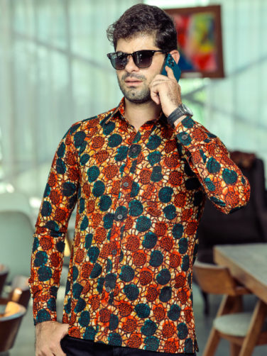Men's red/blue shells custom-made African print long sleeve shirt model wearing front view