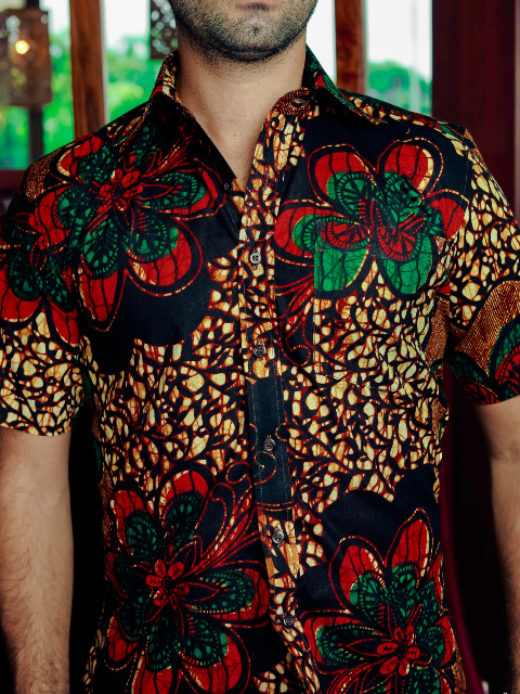 Men's red/green flower custom-made African print short sleeve shirt model wearing front view closeup