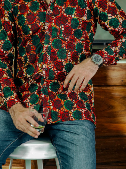 Men's red/green shells custom-made African print long sleeve shirt model wearing closeup