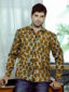 Men's yellow cream shells African print long sleeve shirt model wearing front view