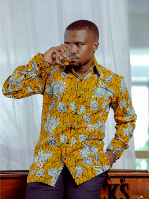 Men's yellow pineapple custom-made African print long sleeve shirt model wearing front view hand in pocket