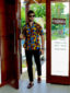 Men's yellow/red/blue peacock custom-made African print short sleeve shirt model wearing full outfit