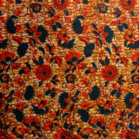 Red and blue floral African print fabric design made in Nigeria West Africa