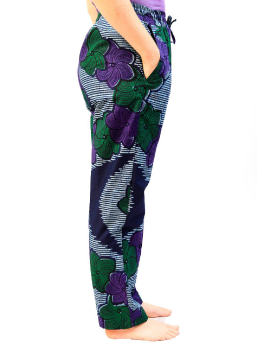 Women's blue green purple made to measure African print trousers model wearing side view