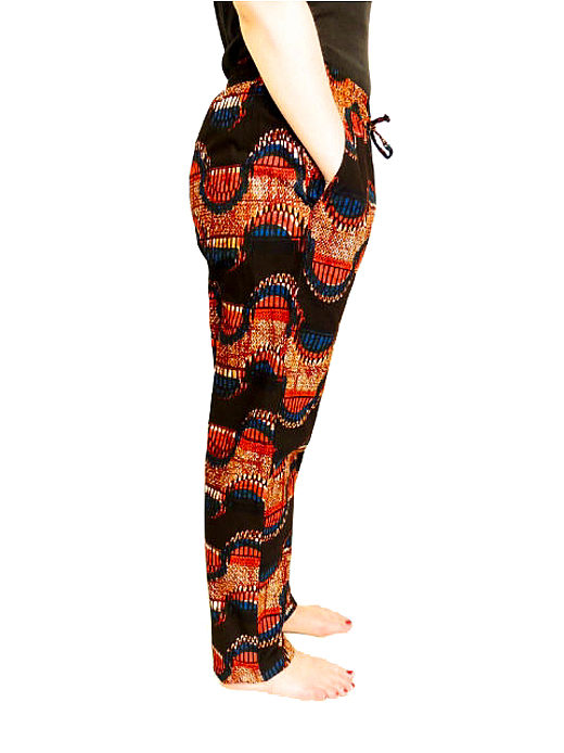 Women's red/black/blue African print made to measure trousers model wearing side view