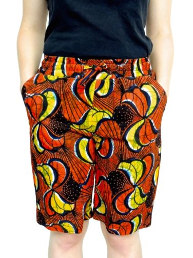 Women's red/yellow African print custom-made shorts model wearing front view