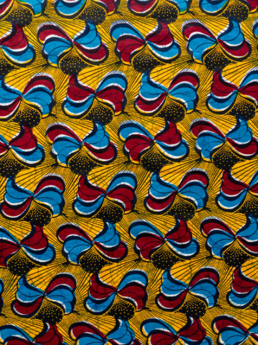 Yellow red and blue peacock African print fabric design
