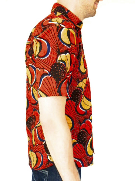 Men's red African print short sleeve shirt model wearing side view