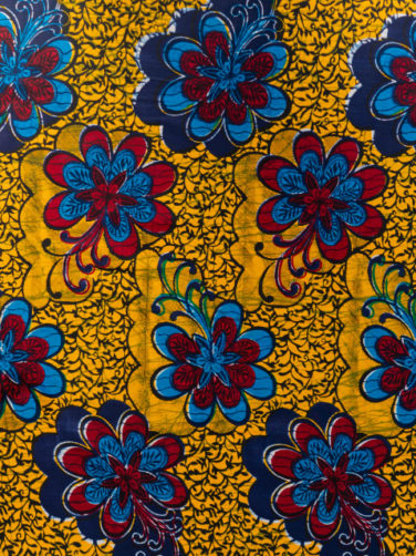 Yellow red blue African wax print fabric motif