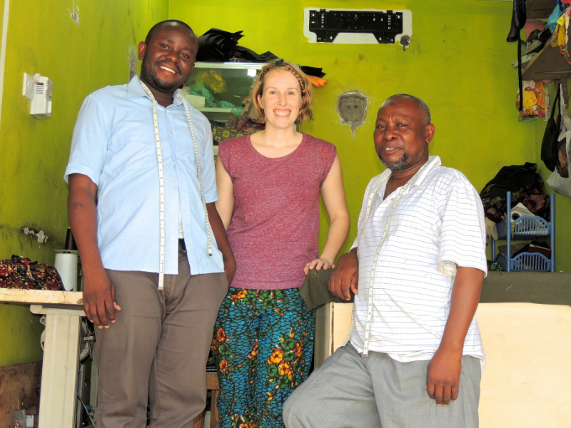 Kitenge founder Sian with tailors who make African print clothing in Tanzania