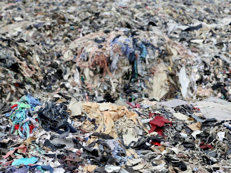 textile clothing waste landfill unwanted clothes sustainable fashion