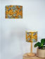 Yellow pineapple African wax print fabric lampshades handmade by Tropikana using Kitenge Store ankara fabric
