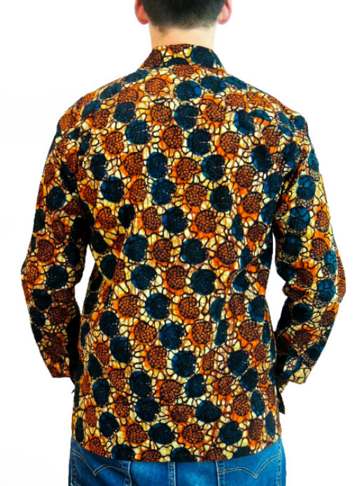 Men's ready to wear red/blue African print long sleeve shirt back view of model wearing with hands in jean pockets