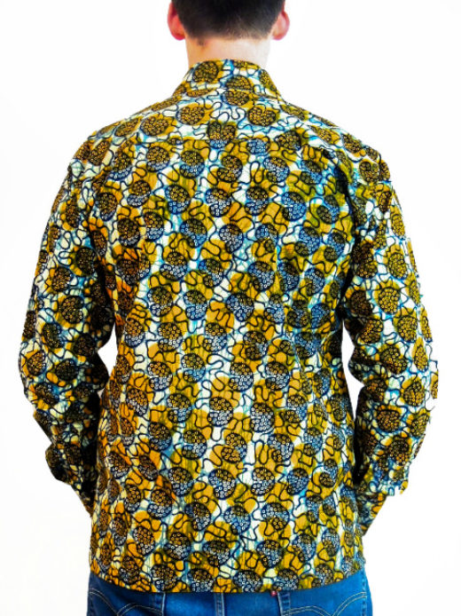 Men's yellow cream ready to wear African wax print long sleeve shirt model wearing back view hands in pockets