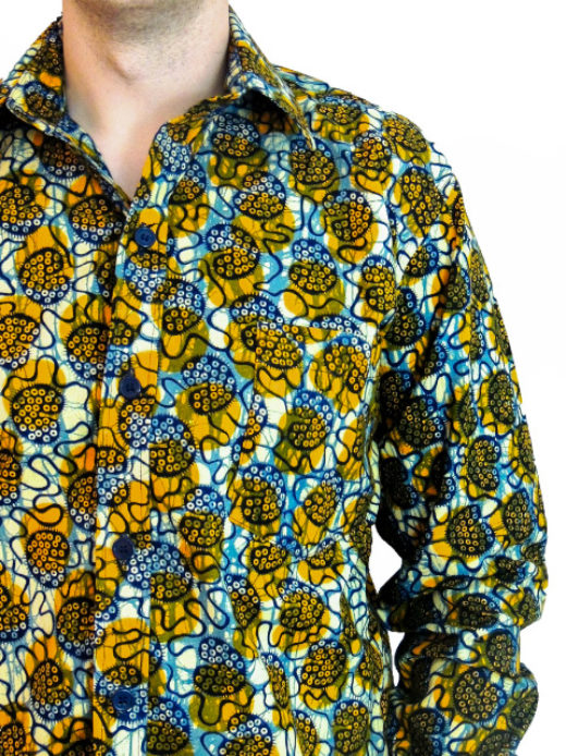 Men's yellow cream ready to wear African wax print long sleeve shirt model wearing front view side pocket closeup