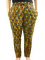 Women's custom made to measure yellow cream African print trousers model wearing front view