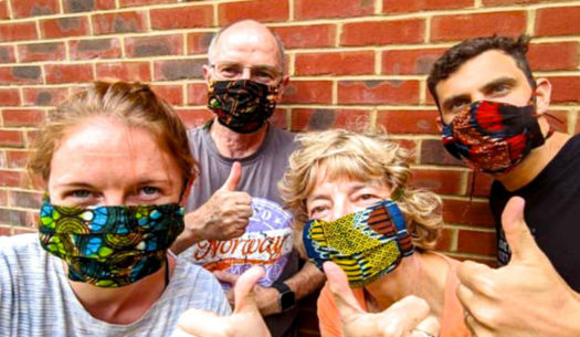Kitenge African print fabric face masks UK customers wearing