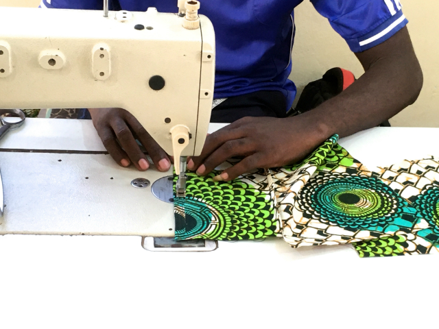 Tailors in Tanzania making African wax print fabric face masks