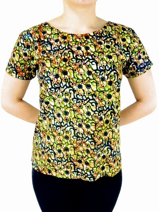 Women's green floral African wax print fabric top model wearing front view