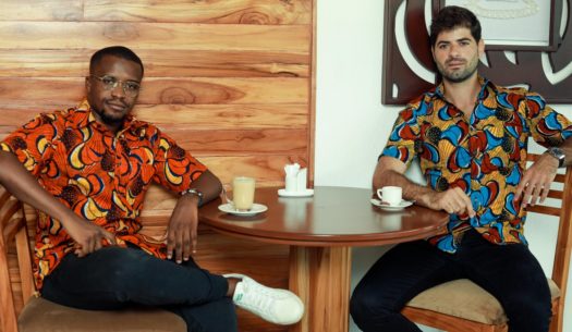 African menswear photoshoot models wearing African print fabric made to measure shirts