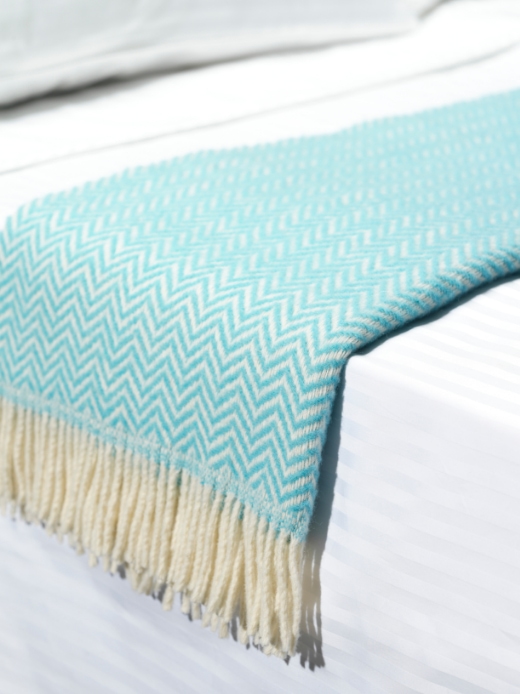 Handwoven cotton bed throw zig-zag pattern African interior design styles
