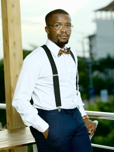 Men's African print bow ties model wearing with suspenders