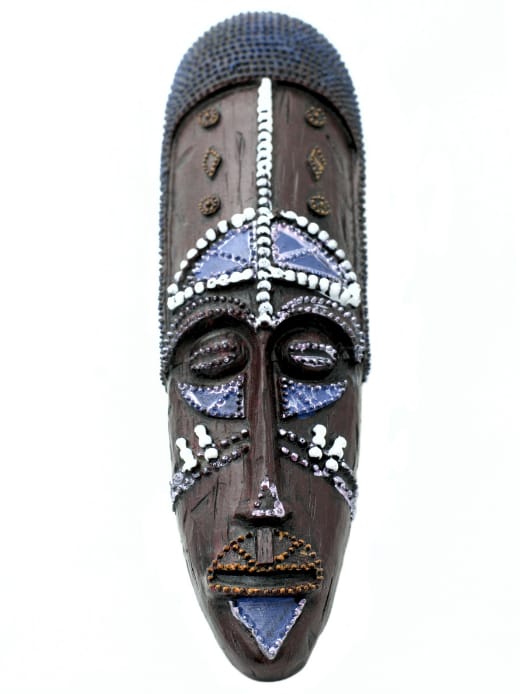 Wooden hand-carved tribal face mask African interior design ideas