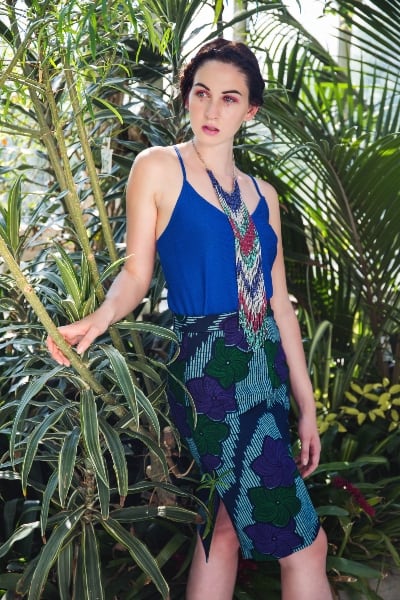 Model wearing women's blue African print pencil skirt custom made by Kitenge Store
