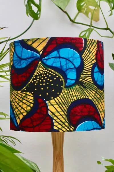 African print fabric lampshade by Tropikala handmade using yellow red blue fabric from Kitenge Store