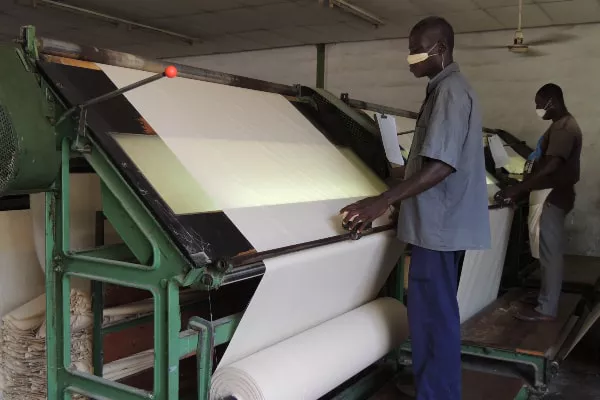 Grey fabric inspection at African wax print fabric factory