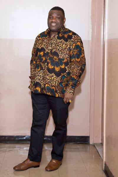 Kitenge customer modelling men's brow African print fabric custom made shirt USA