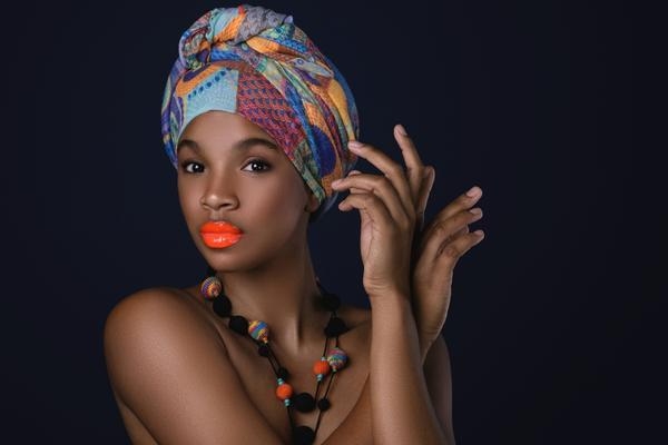 Model wearing African headwrap fashion accessory